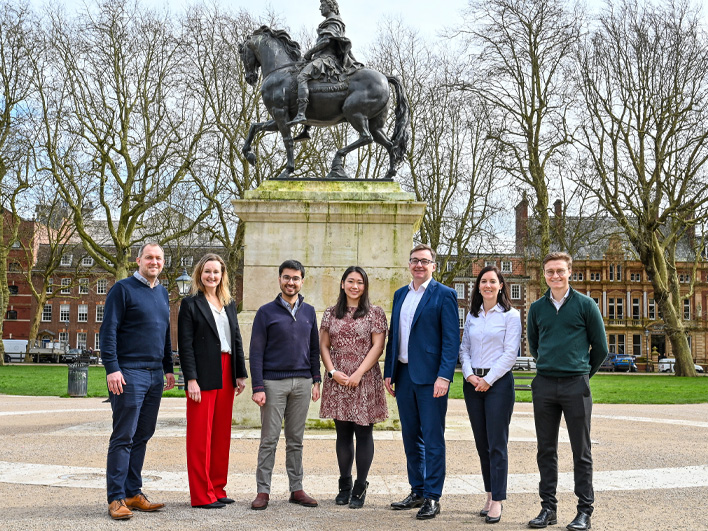Group of LDC Colleagues standing in Queens Square Bristol.
